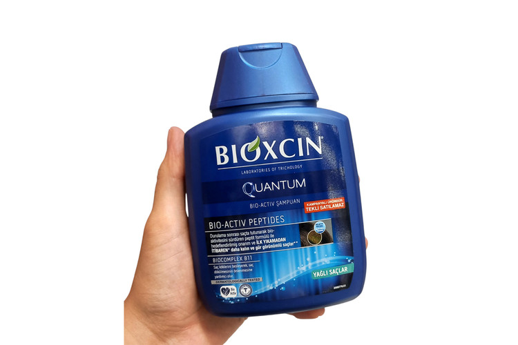 شامپو ضد ریزش مو (آبی رنگ) بیوکسین مدل کوانتوم مناسب موهای چرب حجم 300ml