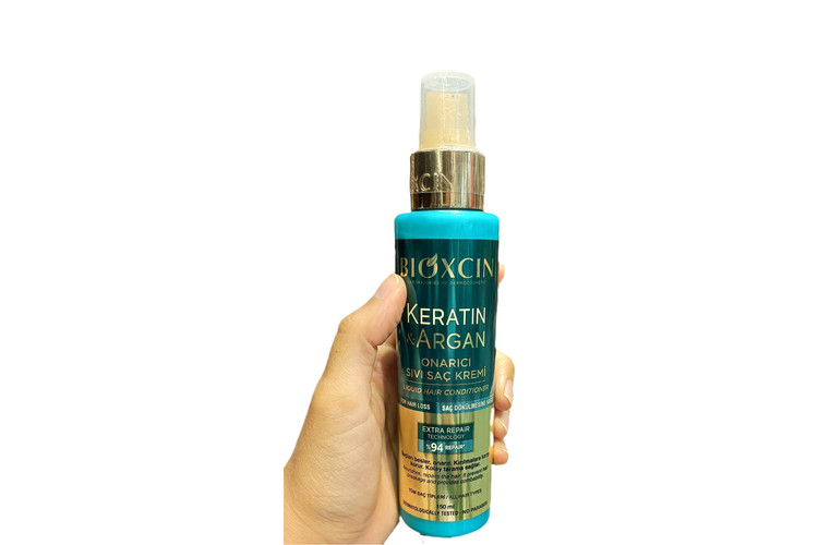 اسپری موی دو فاز ضدریزش و حجم دهنده بیوکسین مدل کراتین و آرگان حجم 150ml